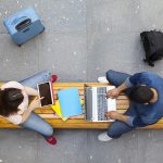 students studying on laptop and tablet