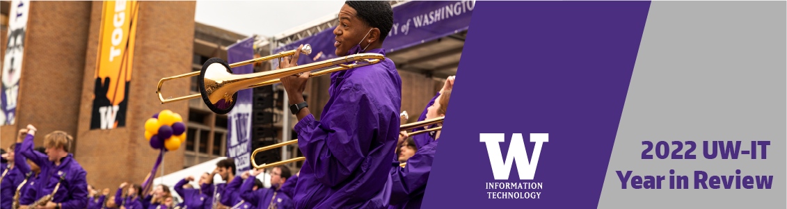 Laughing trumpet player in purple band uniform with fellow band members in UW red square.