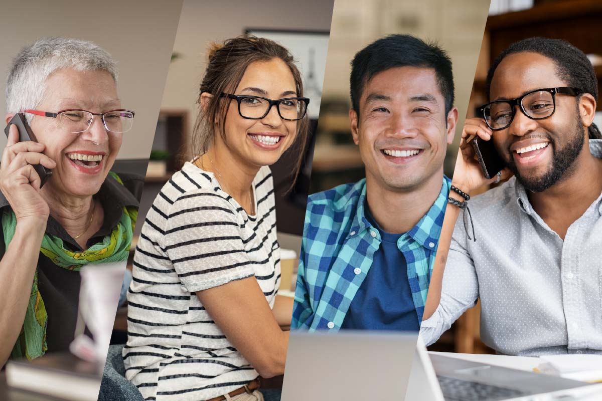 Four people smiling at camera.